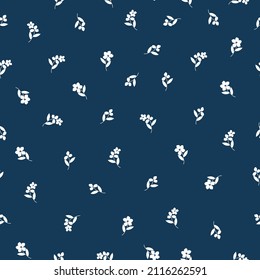 Seamless vintage pattern. Small white flowers and leaves. Dark blue background. vector texture. fashionable print for textiles, wallpaper and packaging.