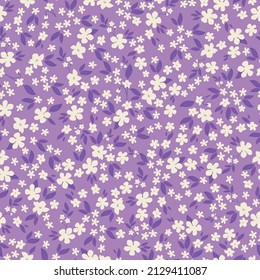 Seamless vintage pattern. Small white flowers, purple leaves. Lilac background. vector texture. fashionable print for textiles, wallpaper and packaging.