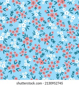 Seamless vintage pattern. Small white and red flowers, dark blue leaves. Light blue background. vector texture. fashionable print for textiles, wallpaper and packaging.