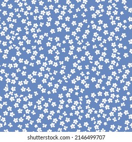Seamless vintage pattern. Small white flowers . light blue background. vector texture. fashionable print for textiles, wallpaper and packaging.