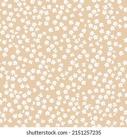 Seamless vintage pattern. Small white flowers . Beige background. vector texture. fashionable print for textiles, wallpaper and packaging.