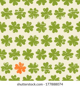 Seamless vintage pattern for St. Patrick's day with four-leaf clovers.