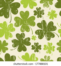 Seamless vintage pattern for St. Patrick's day with four-leaf clovers.