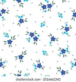 Nahtloses Vintage-Muster. weißer Hintergrund. wunderschöne blaue und dunkelblaue Blumen. grüne Blätter. Vektorstruktur. modischer Druck für Textilien.