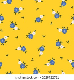 Seamless vintage pattern . white and blue flowers , green leaves on a yellow background. vector texture. a trend template for fashionable prints.
