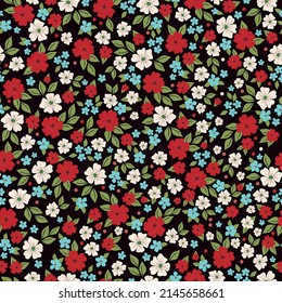 Seamless vintage pattern. White, blue and red flowers. green leaves. Black background. vector texture. fashionable print for textiles, wallpaper and packaging.