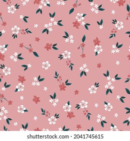 Seamless vintage pattern. white and coral flowers, dark leaves. pink background. a vector image. trend print for textiles and wallpaper.
