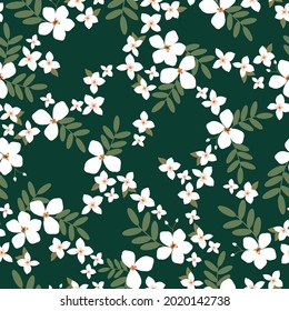 Seamless vintage pattern. white flowers and green leaves on a dark green background. vector texture. trend print for textiles and wallpaper.
