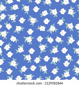 Seamless vintage pattern. White flowers, light green leaves. Blue background. vector texture. fashionable print for textiles, wallpaper and packaging.