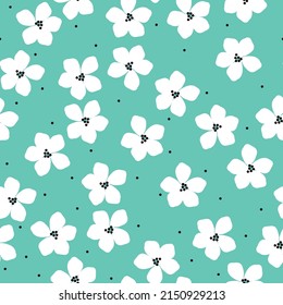 Seamless vintage pattern. white flowers, black dots. Turquoise background. vector texture. fashionable print for textiles, wallpaper and packaging.