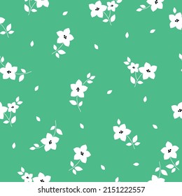 Seamless vintage pattern. White flowers and leaves . Green background. vector texture. fashionable print for textiles, wallpaper and packaging.
