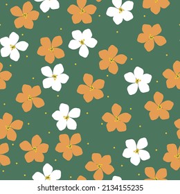 Seamless vintage pattern. White and orange flowers . Green background. vector texture. fashionable print for textiles, wallpaper and packaging.