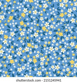 Seamless vintage pattern. White and yellow flowers, dark blue leaves. Light blue background. vector texture. fashionable print for textiles, wallpaper and packaging.
