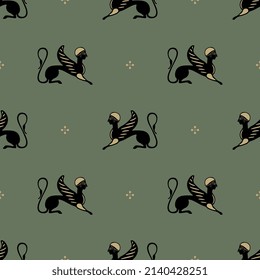 Seamless vintage pattern with winged sphinxes. Ancient Greek ethnic animal motif. On green background.