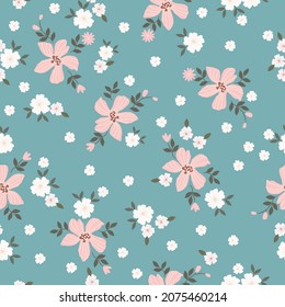 Nahtloses Vintage-Muster. Wunderschöne hellrosa und weiße Blumen. dunkelgrüne Blätter. hellblauer Hintergrund. Ditsy-floraler Hintergrund. Die elegante Vorlage für Modedrucke. Stock-Vektorgrafik.