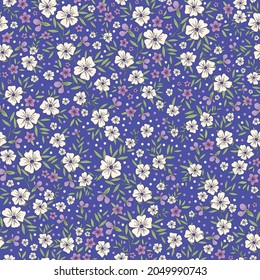 Seamless vintage pattern. wonderful lilac, white flowers and dots, green leaves on a purple background. vector texture. trend print for textiles, wallpaper and packaging.