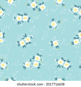 Seamless vintage pattern. wonderful white flowers and dots on a light blue background. vector texture. trend print for textiles.