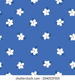 Seamless vintage pattern. wonderful white flowers ,dark blue leaves. bright blue background. vector texture. trend print for textiles and wallpaper.