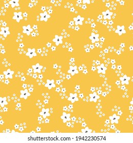 seamless vintage pattern . yellow background. white flowers . vector texture. trend print for textiles and wallpaper.