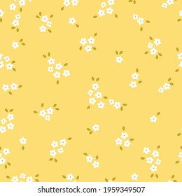 seamless vintage pattern. yellow background. small white flowers.veseniy bouquet. trend print for textiles and wallpaper.