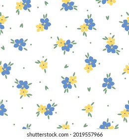 Seamless vintage pattern. yellow and blue flowers on a white background. vector texture. trend print for textiles and wallpaper.