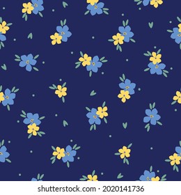 Seamless vintage pattern. yellow and blue flowers , green leaves on a dark blue background. vector texture. trend print for textiles and wallpaper.