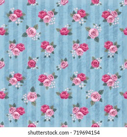 Seamless vintage romantic pattern with pink roses on shabby blue background. Retro wallpaper style. Shabby chic design. Perfect for scrapbooking, greeting cards etc