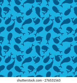 seamless wallpaper of a blue whale on a light blue background