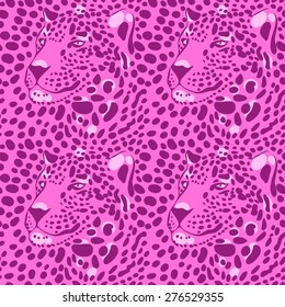 seamless wallpaper with a leopard print and a silhouette of the muzzle of leopard