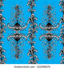Seamless wallpaper pattern in vintage style on light blue background. 