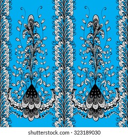 Seamless wallpaper pattern in vintage style on light blue background. 