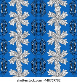 Seamless wallpaper pattern in vintage style on blue background.