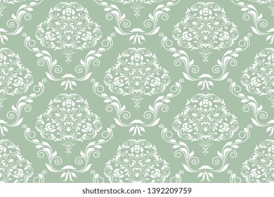 Seamless wallpaper pattern. White floral ornament on green background. Seamless pattern for your design. Wallpaper pattern