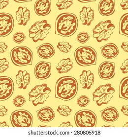 Seamless walnuts background. Sketch walnuts. Hand drawn pattern made in vector. For your design, textile, fabric, surface textures, packaging.
