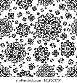 Seamless white background with black mandala ornament in the east style. Ideal for printing on fabric or paper for textile, wrapping. Vector illustration.