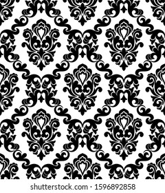 Seamless white background with black pattern in baroque style. Vector retro illustration. Ideal for printing on fabric or paper for wallpapers, textile, wrapping. 
