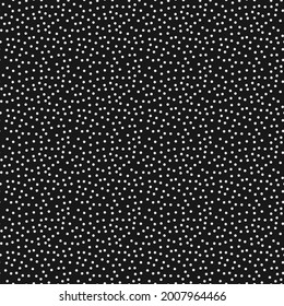 Seamless white dots on black background. Vector white flakes.