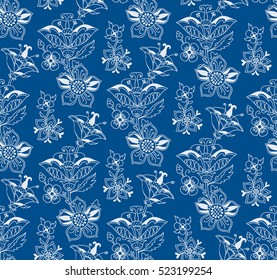 seamless white  floral pattern of white flowers on a blue background