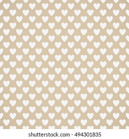 Seamless white hearts pattern on brown background