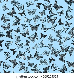 Seamless white pattern with silhouettes of butterflies