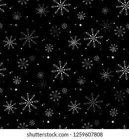 Seamless white snowflakes pattern on black. eps 10