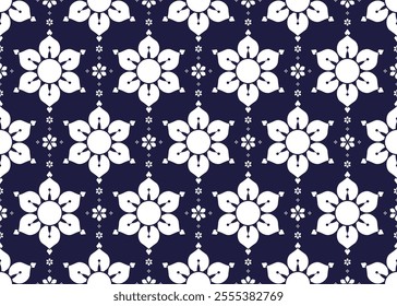 Seamless white symbol floral on dark blue background, ethnic fabric seamless pattern, design for cloth, carpet, batik, wallpaper, wrapping etc.