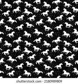 Patrón de unicornio blanco sin foco sobre fondo negro con estrellas. Imprime divertido para tela, papel y web.