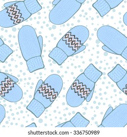 Seamless winter background. Mittens and snow flakes. Handmade. Vector illustration.
