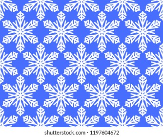 Seamless winter background with snowflake motif, white snowflakes on vivid blue background,