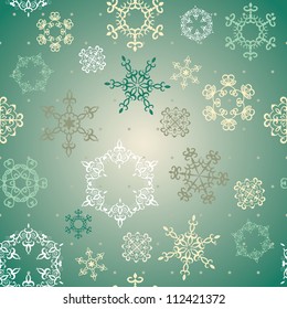 Seamless winter background with snowflakes