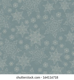 Seamless winter background with snowflakes