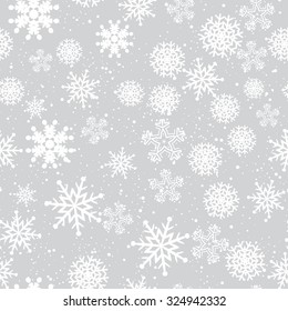 Seamless winter background with snowflakes