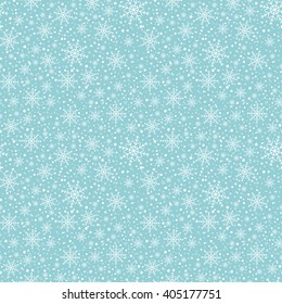 Seamless winter background with snowflakes.