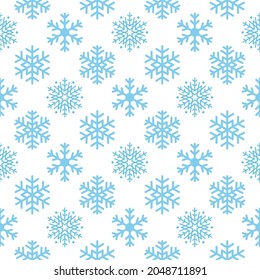 Nahtloser Winterhintergrund aus Schneeflocken, in regelmäßigen Reihen angeordnet. Wintermärchen, Weihnachtssymbol.